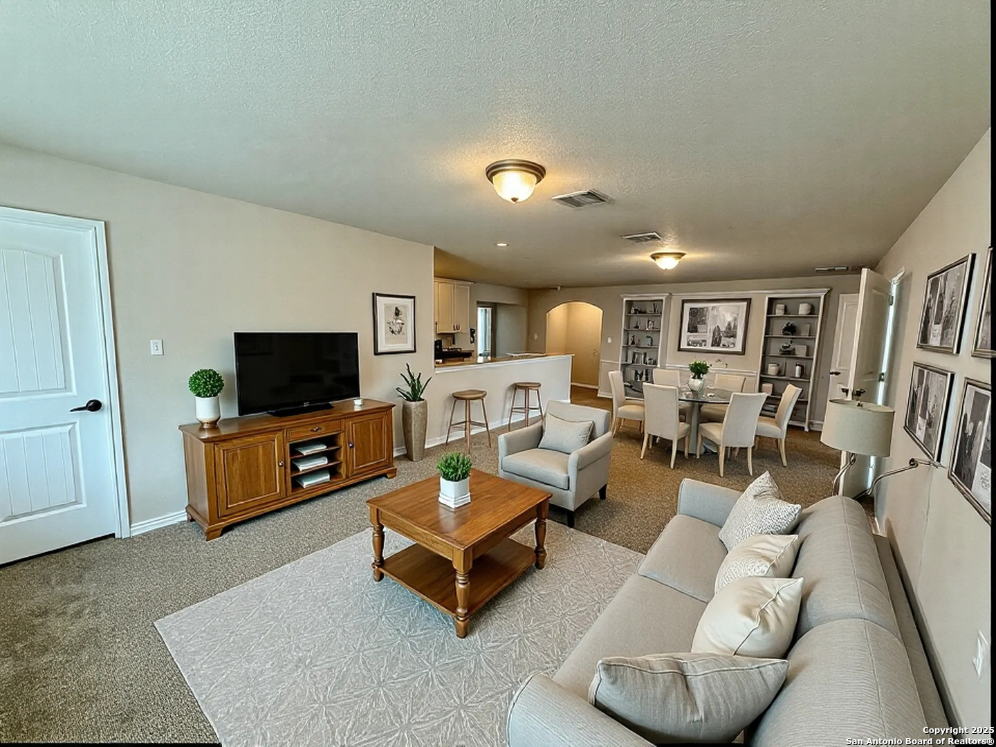 2930 Elm Tree Park San Antonio, TX 78259 - Photo 28 of 44 a living room with furniture and a flat screen tv