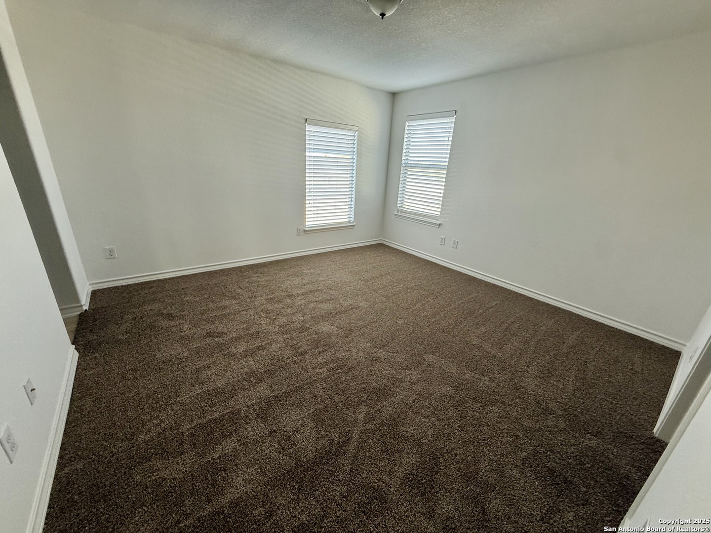 2930 Elm Tree Park San Antonio, TX 78259 - Photo 40 of 44 an empty room with windows