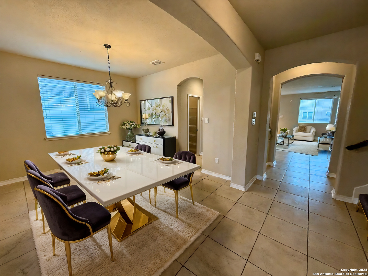 2930 Elm Tree Park San Antonio, TX 78259 - Photo 4 of 44 a view of a dining room and livingroom with furniture wooden floor a chandelier