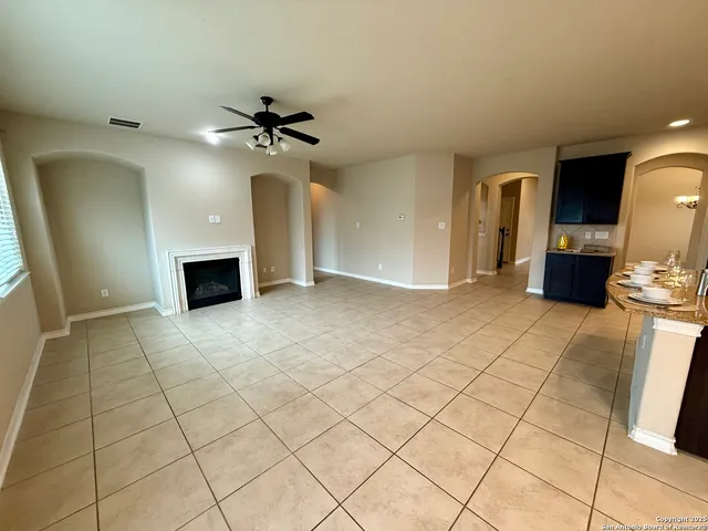 a large kitchen with stainless steel appliances lots of counter top space