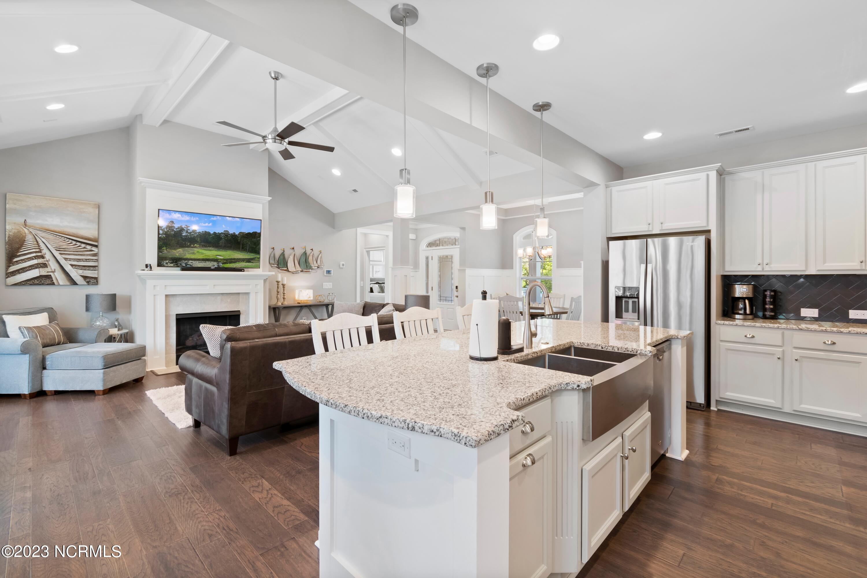 153 Clubhouse Road Sunset Beach, NC 28468 - Photo 13 of 65 Kitchen to Living room