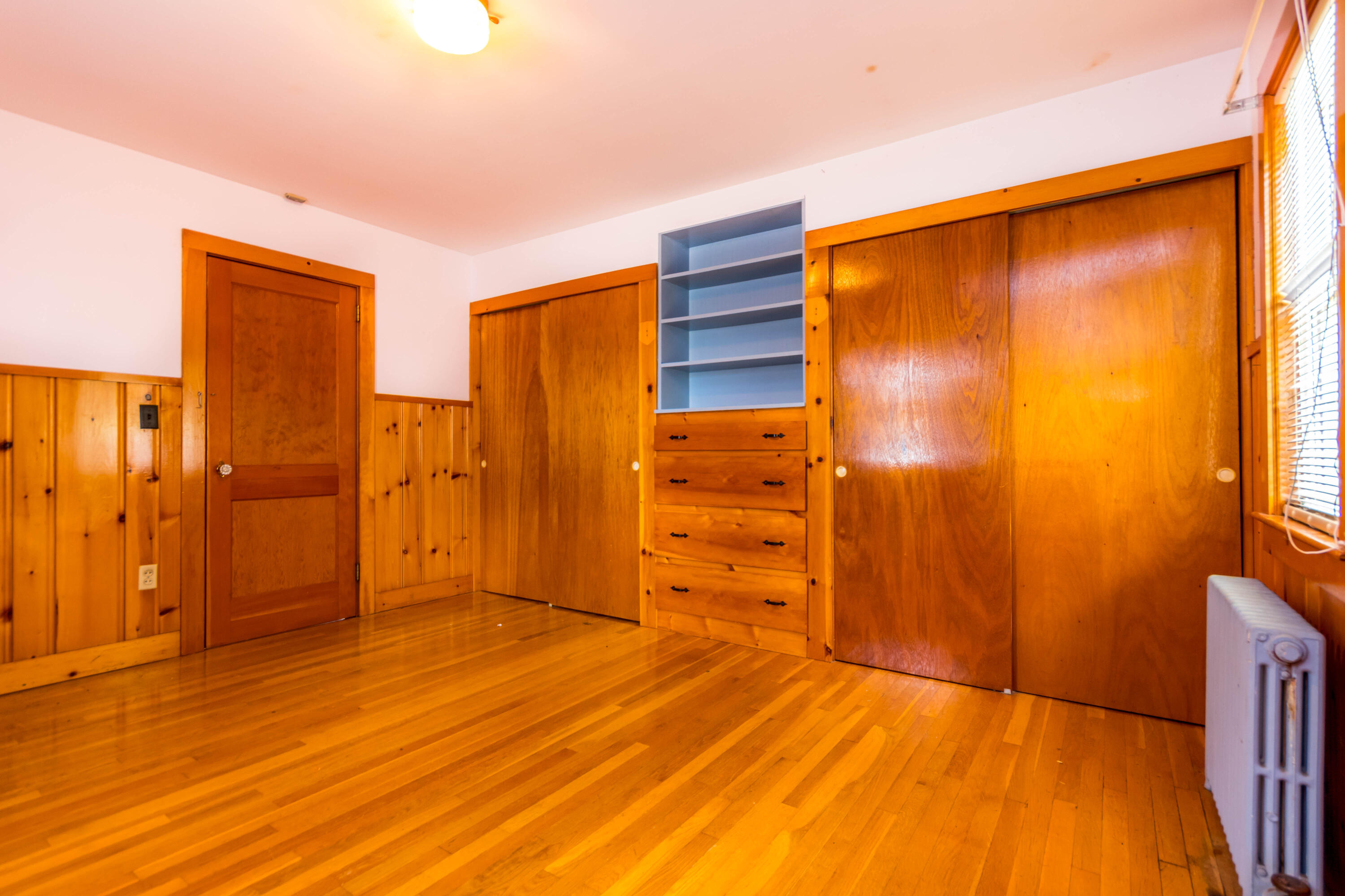 655 County Road Rochester, MA 02576 - Photo 12 of 26 a view of empty room with wooden floor and cabinet