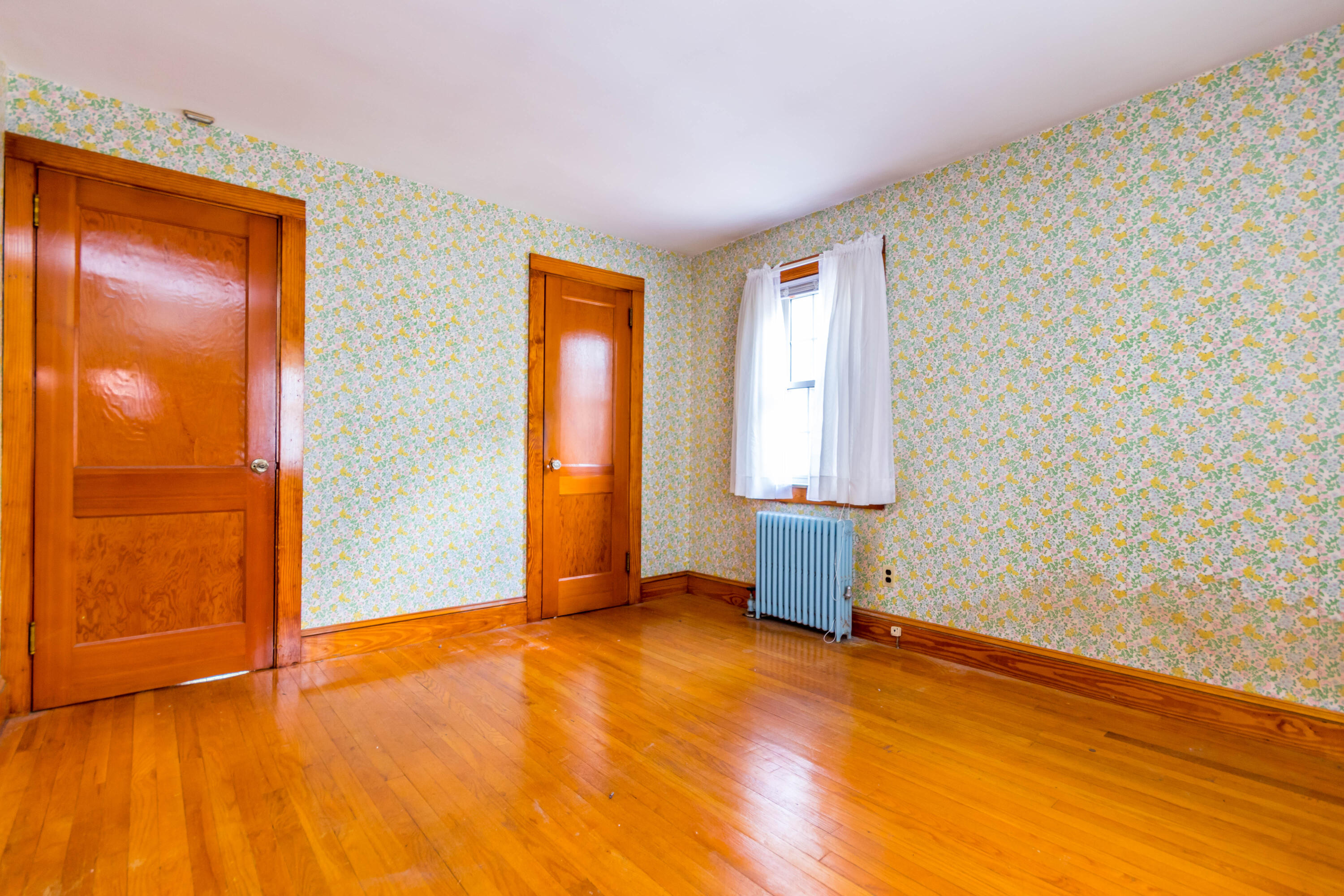 655 County Road Rochester, MA 02576 - Photo 18 of 26 a view of empty room with wooden floor and fan