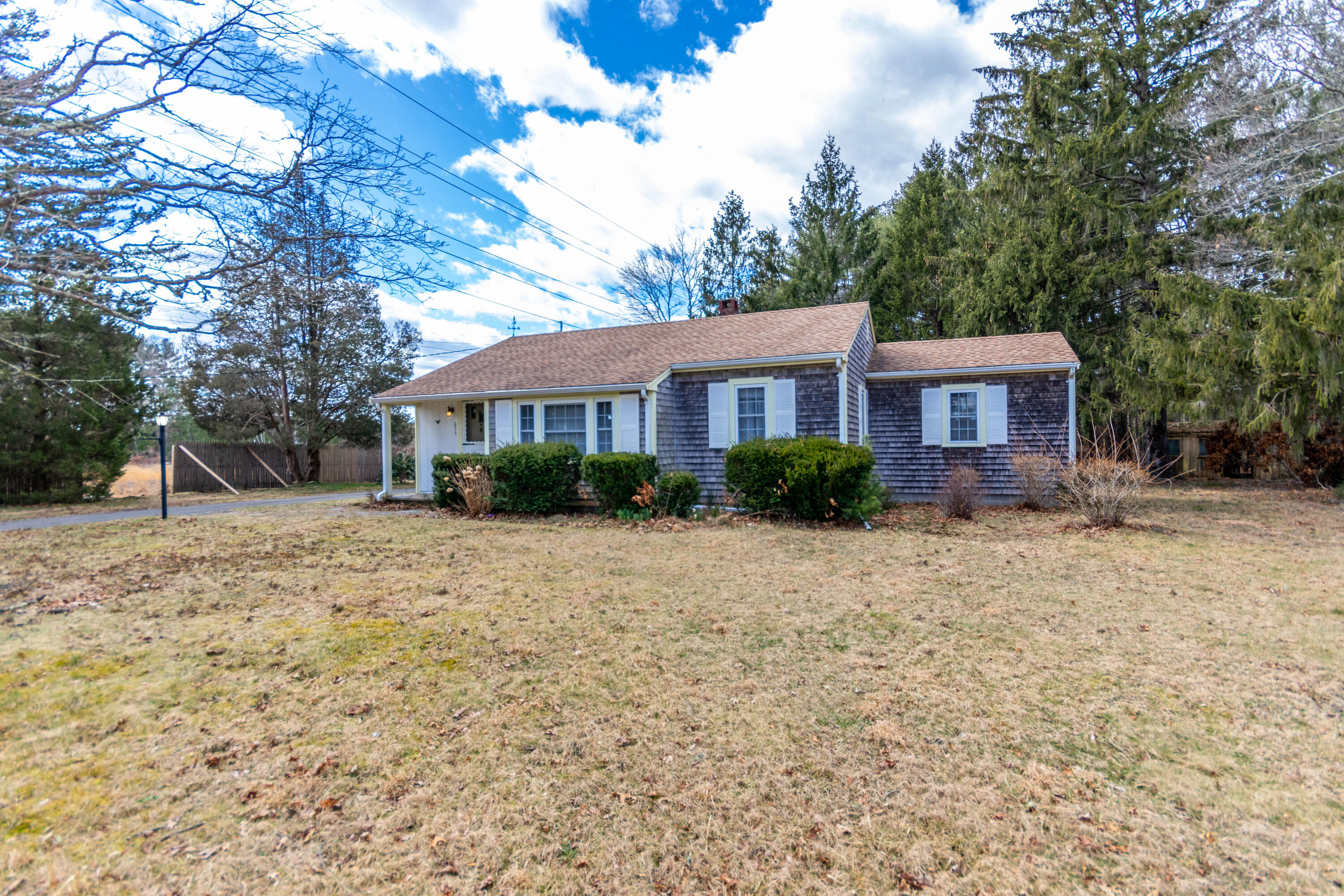 655 County Road Rochester, MA 02576 - Photo 20 of 26 a front view of a house with a yard