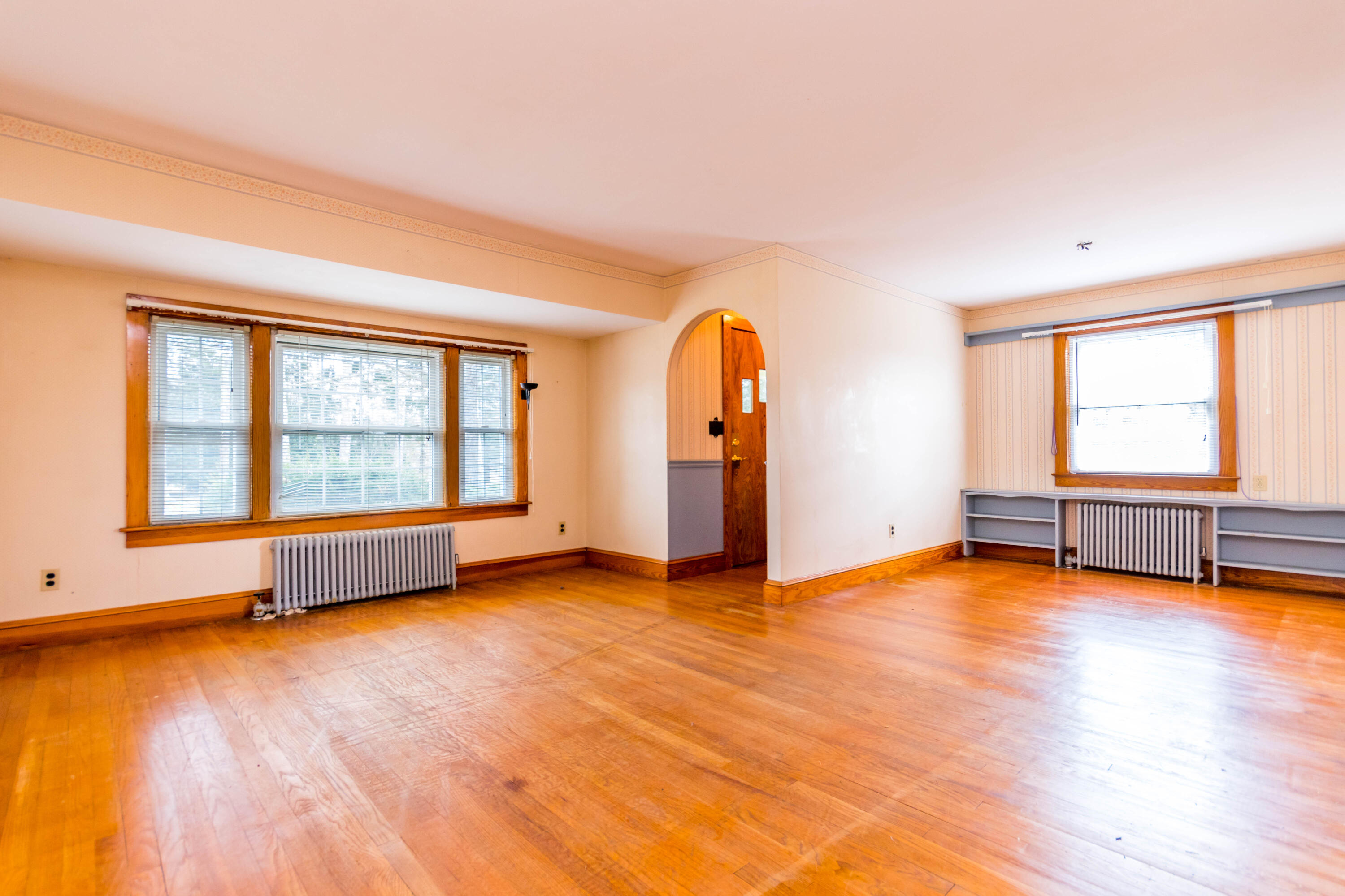 655 County Road Rochester, MA 02576 - Photo 4 of 26 a view of an empty room with window and wooden floor