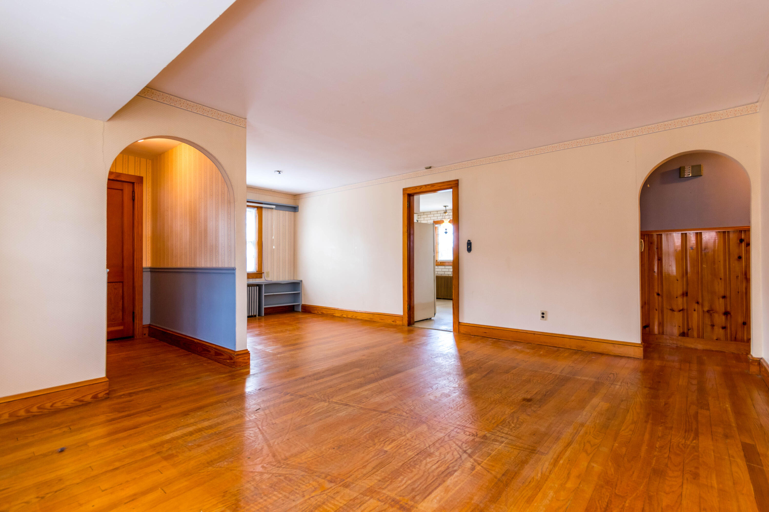 655 County Road Rochester, MA 02576 - Photo 5 of 26 a view of empty room with wooden floor and fan