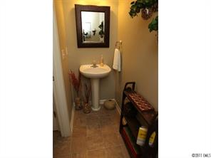 215 Dawn Mist Lane, Unit 215 Fort Mill, SC 29708 - Photo 9 of 16 a bathroom with a sink and a mirror