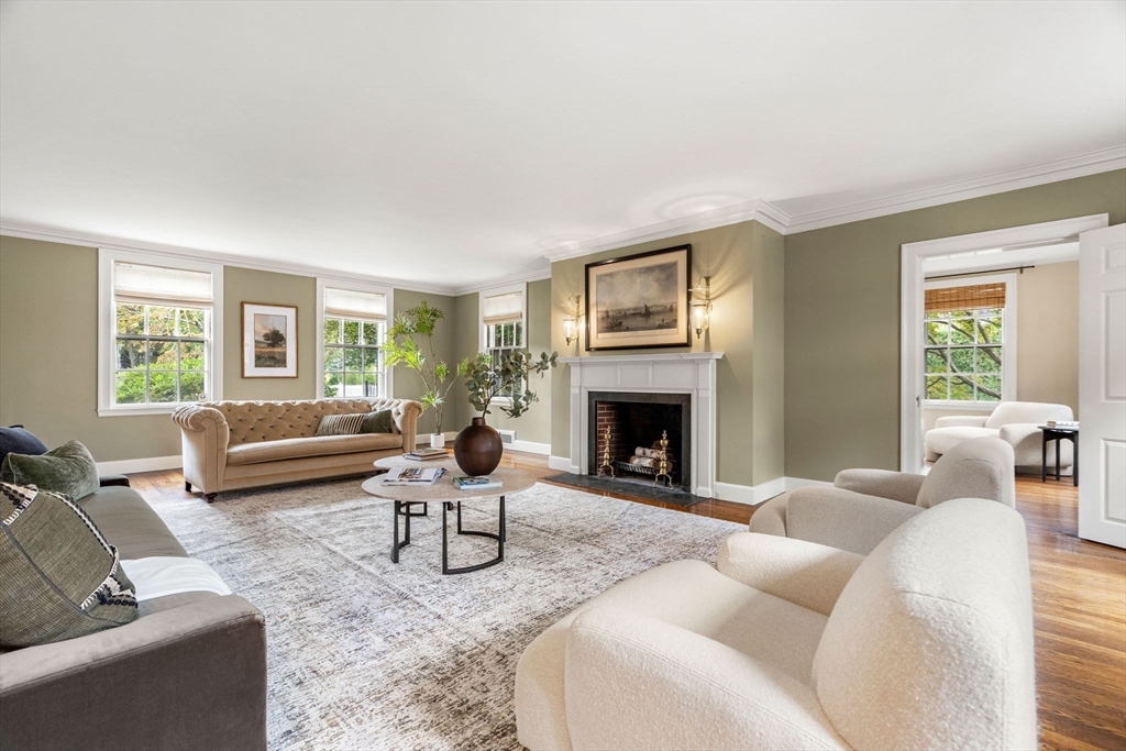20 Foxcroft Road Winchester, MA 01890 - Photo 14 of 42 a living room with furniture and a fireplace