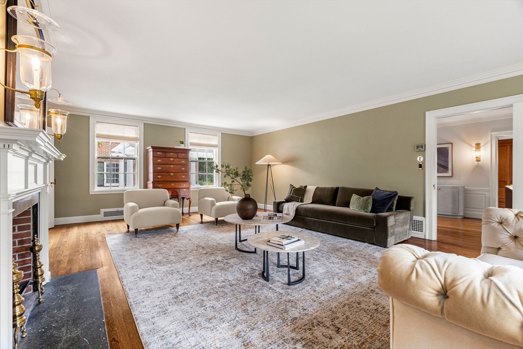 20 Foxcroft Road Winchester, MA 01890 - Photo 15 of 42 a living room with furniture and a fireplace