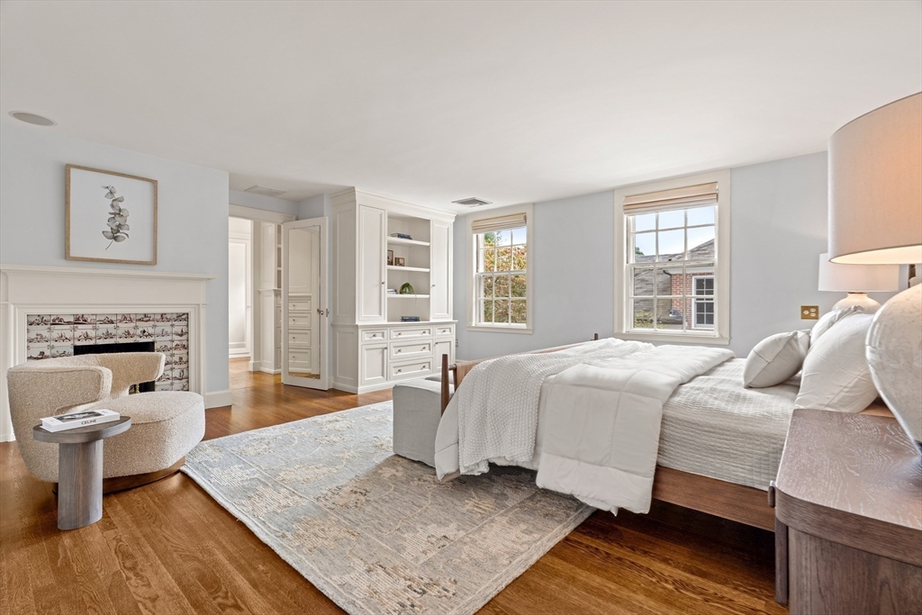 20 Foxcroft Road Winchester, MA 01890 - Photo 18 of 42 a spacious bedroom with a bed and a couch