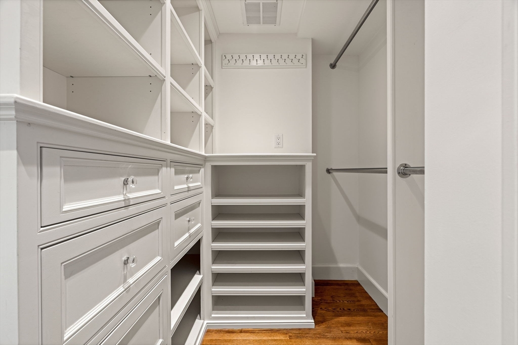 20 Foxcroft Road Winchester, MA 01890 - Photo 19 of 42 a view of walk in closet with empty racks