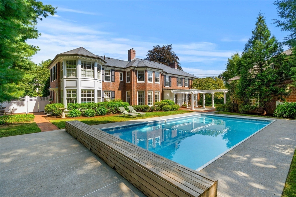 20 Foxcroft Road Winchester, MA 01890 - Photo 2 of 42 a view of an house with swimming pool and yard