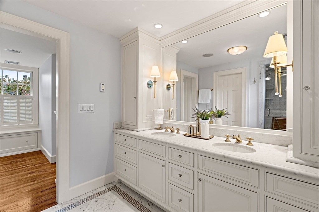 20 Foxcroft Road Winchester, MA 01890 - Photo 22 of 42 a bathroom with double sink and a mirror
