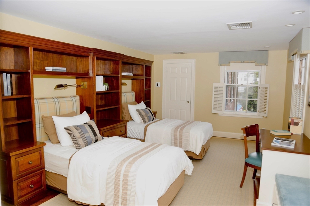 20 Foxcroft Road Winchester, MA 01890 - Photo 28 of 42 a bedroom with two beds and a window