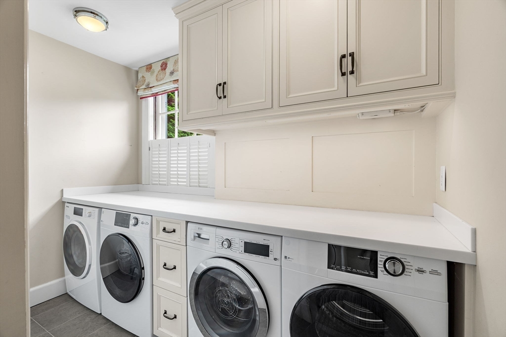 20 Foxcroft Road Winchester, MA 01890 - Photo 30 of 42 a utility room with dryer and washer