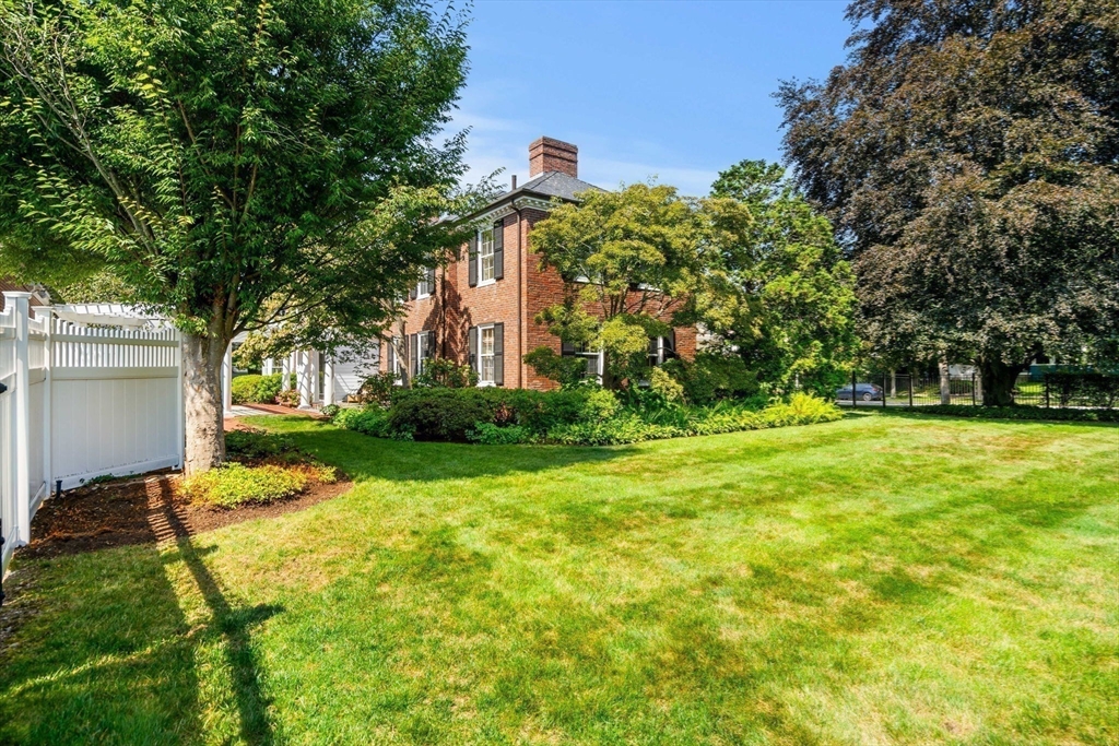20 Foxcroft Road Winchester, MA 01890 - Photo 40 of 42 a view of a house with a yard