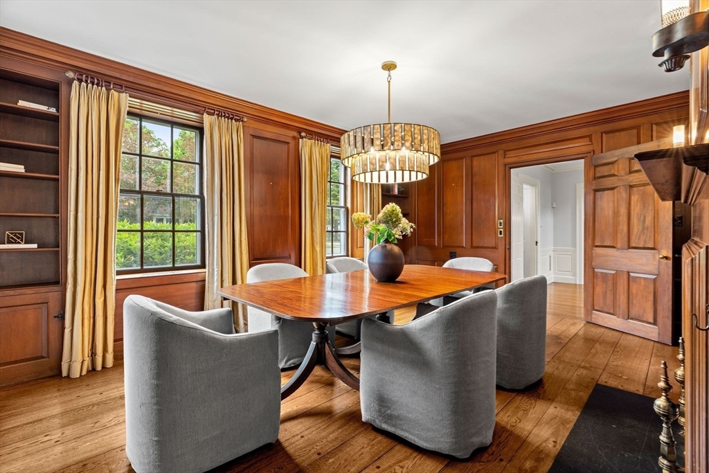 20 Foxcroft Road Winchester, MA 01890 - Photo 5 of 42 a dining room with furniture a chandelier and wooden floor