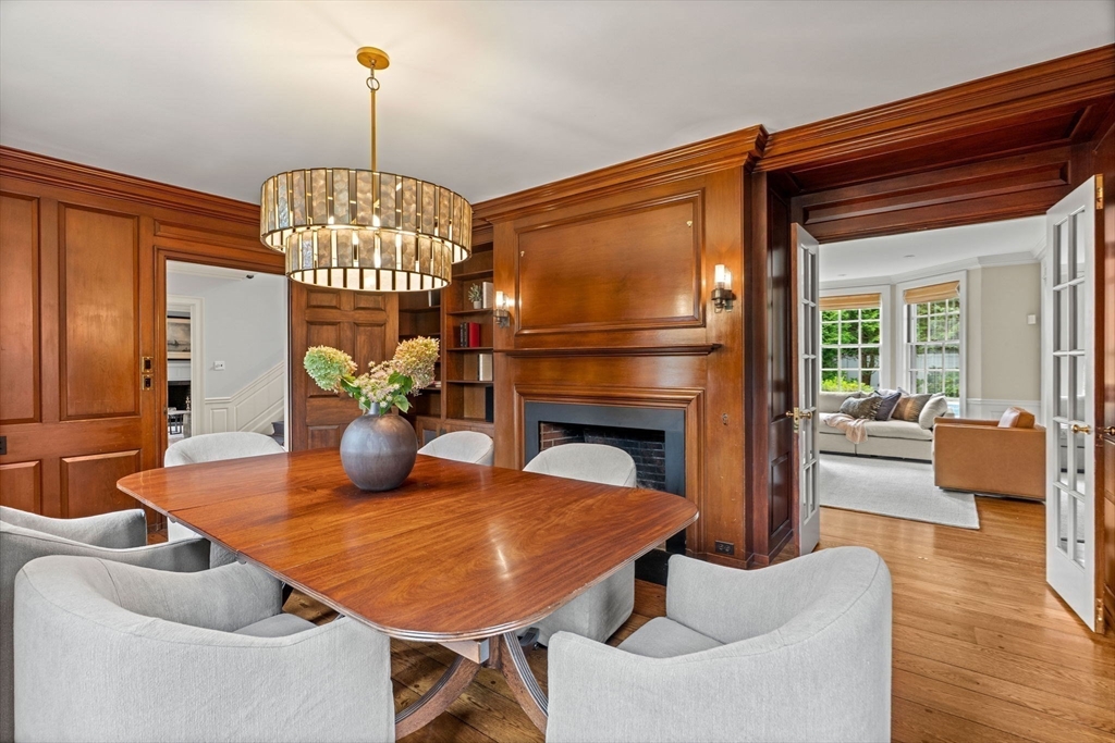 20 Foxcroft Road Winchester, MA 01890 - Photo 6 of 42 a view of a dining room with furniture a chandelier and wooden floor