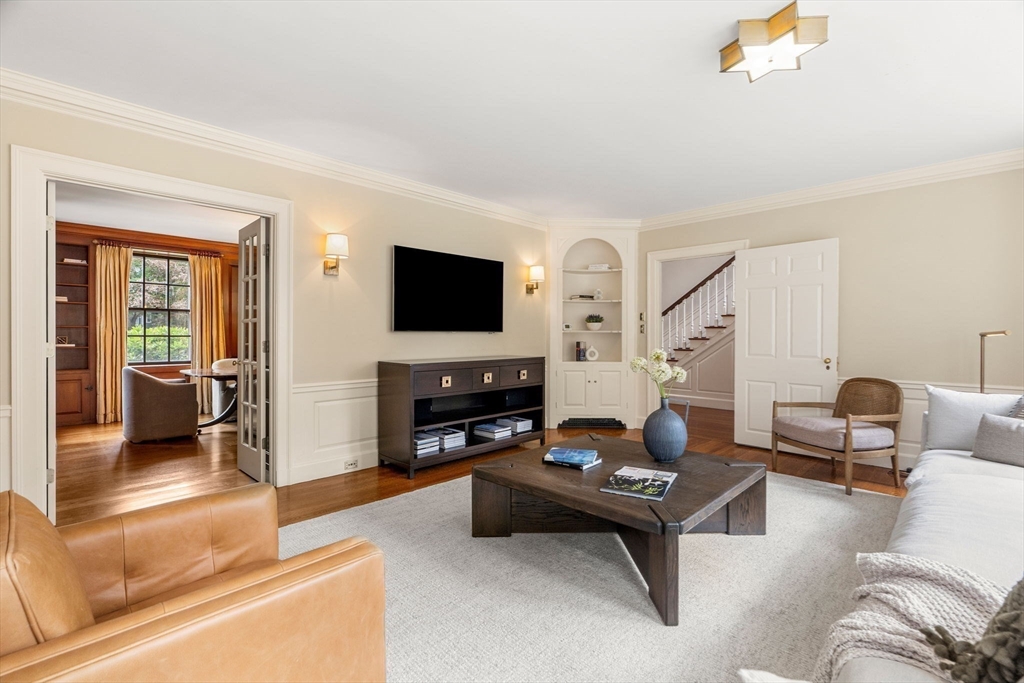 20 Foxcroft Road Winchester, MA 01890 - Photo 8 of 42 a living room with furniture and a flat screen tv