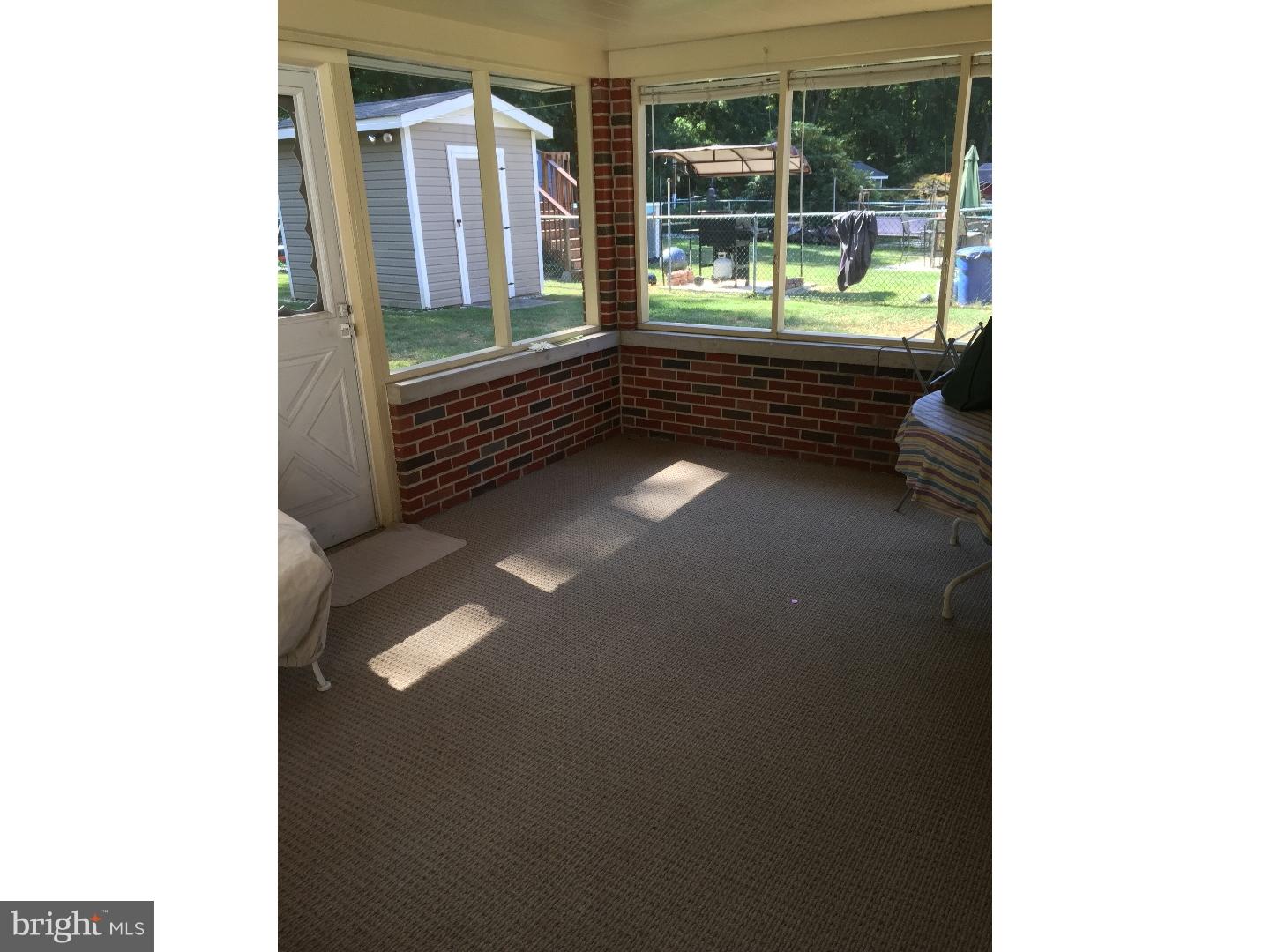 11869 Sewell Road Philadelphia, PA 19116 - Photo 17 of 18 Enclosed Porch
