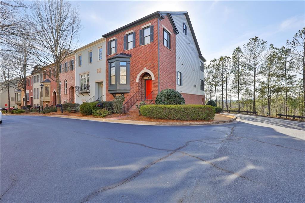 140 West Ridge Way Roswell, GA 30076 - Photo 1 of 1 a front view of a house with garden