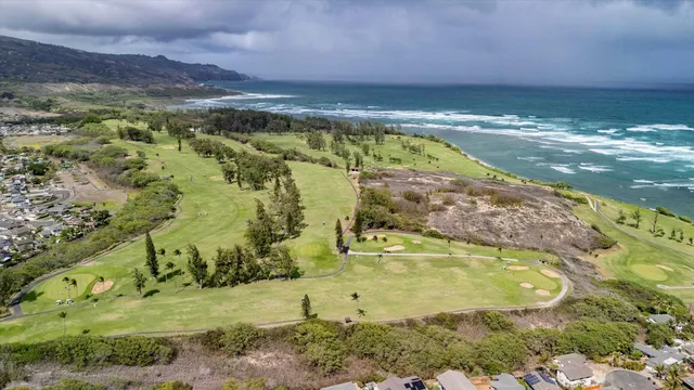 a view of a lake with a yard