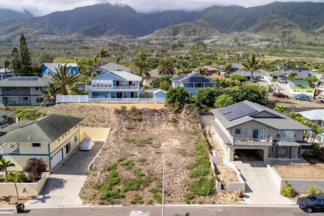 an aerial view of residential houses with a outdoor space
