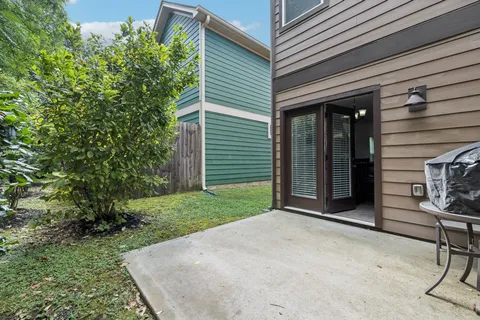 a view of a backyard with hardwood