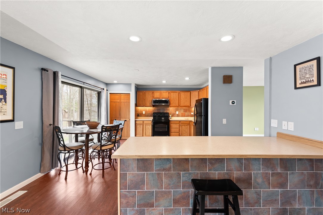 17364 Falling Water Road Strongsville, OH 44136 - Photo 12 of 36 Kitchen Off Living Room with Large Kitchen Island/Bar