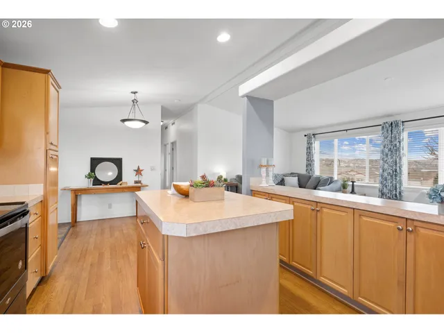 a workspace with furniture and a window