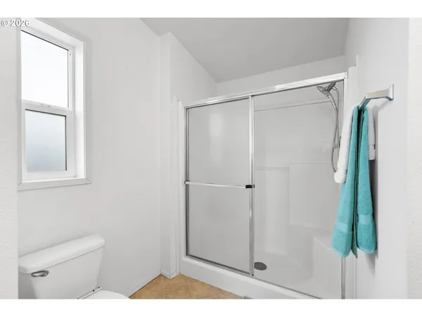 a swimming pool with yard and outdoor seating