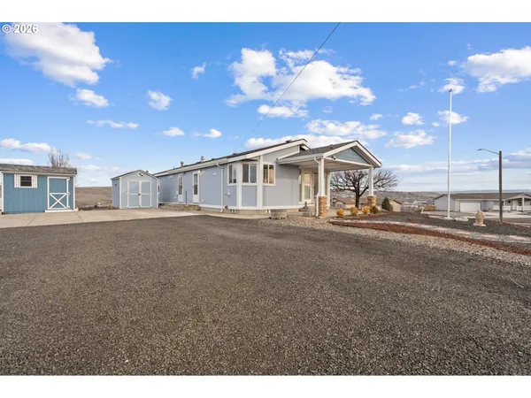 a black and white photo of a living room