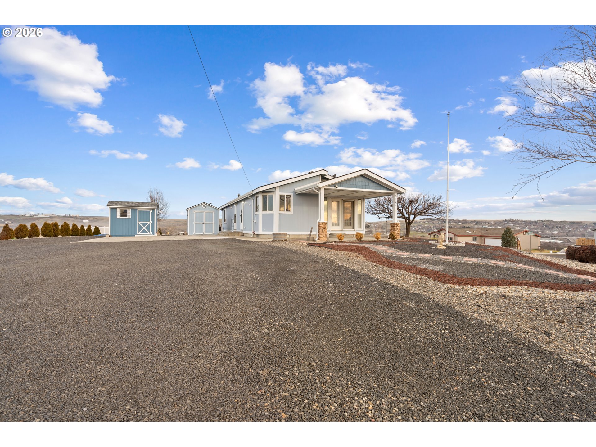 3127 Southwest River View Drive Pendleton, OR 97801 - Photo 29 of 33 a view of a house with a yard