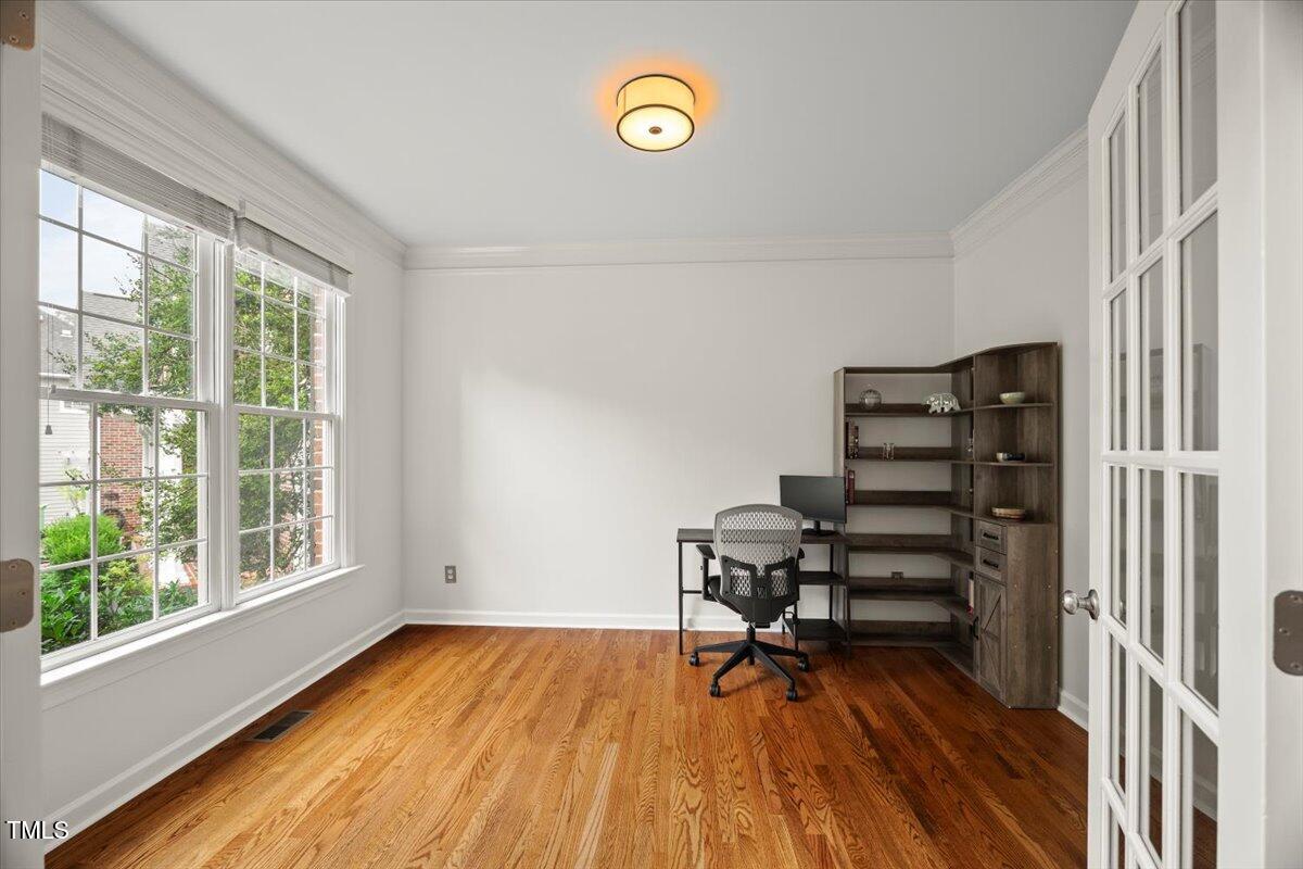 12204 Kaysmount Court Raleigh, NC 27614 - Photo 10 of 50 a view of a room with furniture and a window