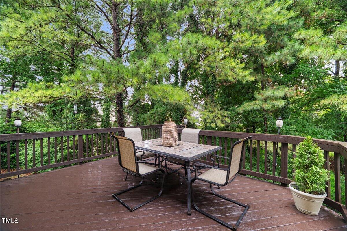 12204 Kaysmount Court Raleigh, NC 27614 - Photo 21 of 50 a view of a table and chairs on the roof deck