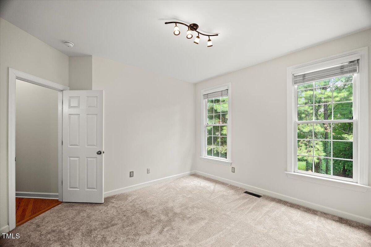 12204 Kaysmount Court Raleigh, NC 27614 - Photo 24 of 50 a view of an empty room with a window