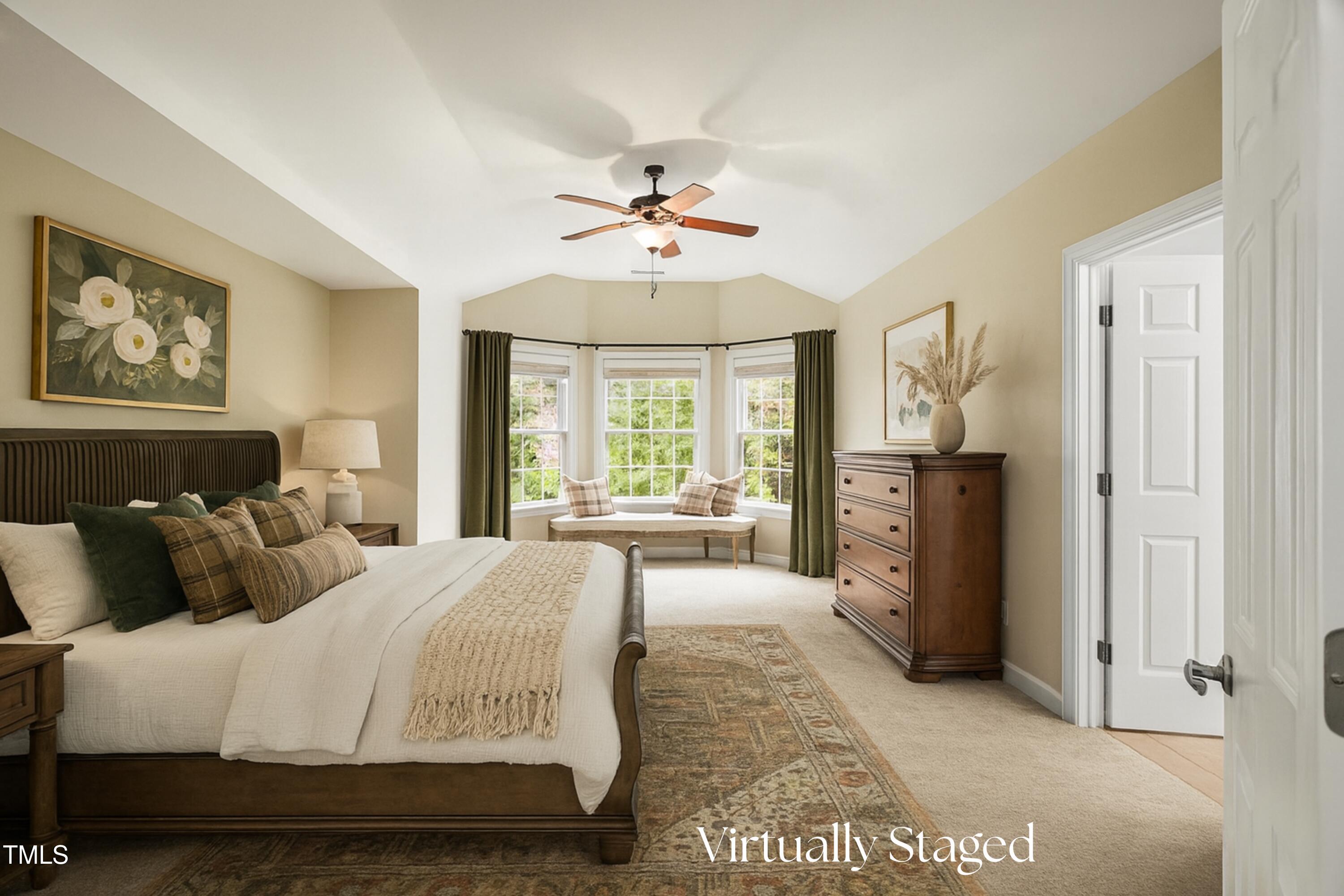 12204 Kaysmount Court Raleigh, NC 27614 - Photo 26 of 50 a spacious bedroom with bed and a large window