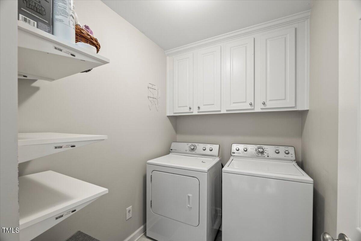 12204 Kaysmount Court Raleigh, NC 27614 - Photo 31 of 50 a utility room with dryer and washer