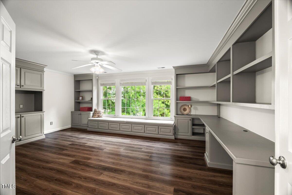 12204 Kaysmount Court Raleigh, NC 27614 - Photo 35 of 50 a view of empty room with wooden floor and fan