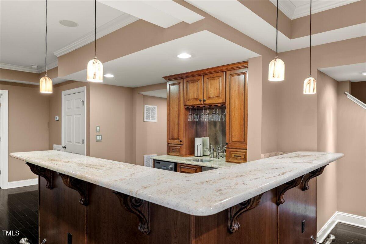 12204 Kaysmount Court Raleigh, NC 27614 - Photo 41 of 50 a kitchen with a table chairs and refrigerator