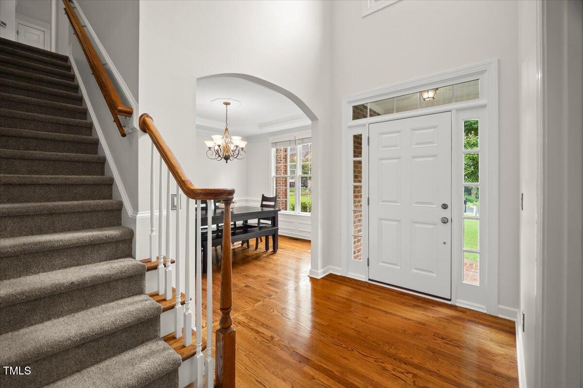 12204 Kaysmount Court Raleigh, NC 27614 - Photo 6 of 50 a view of entryway and hall with wooden floor