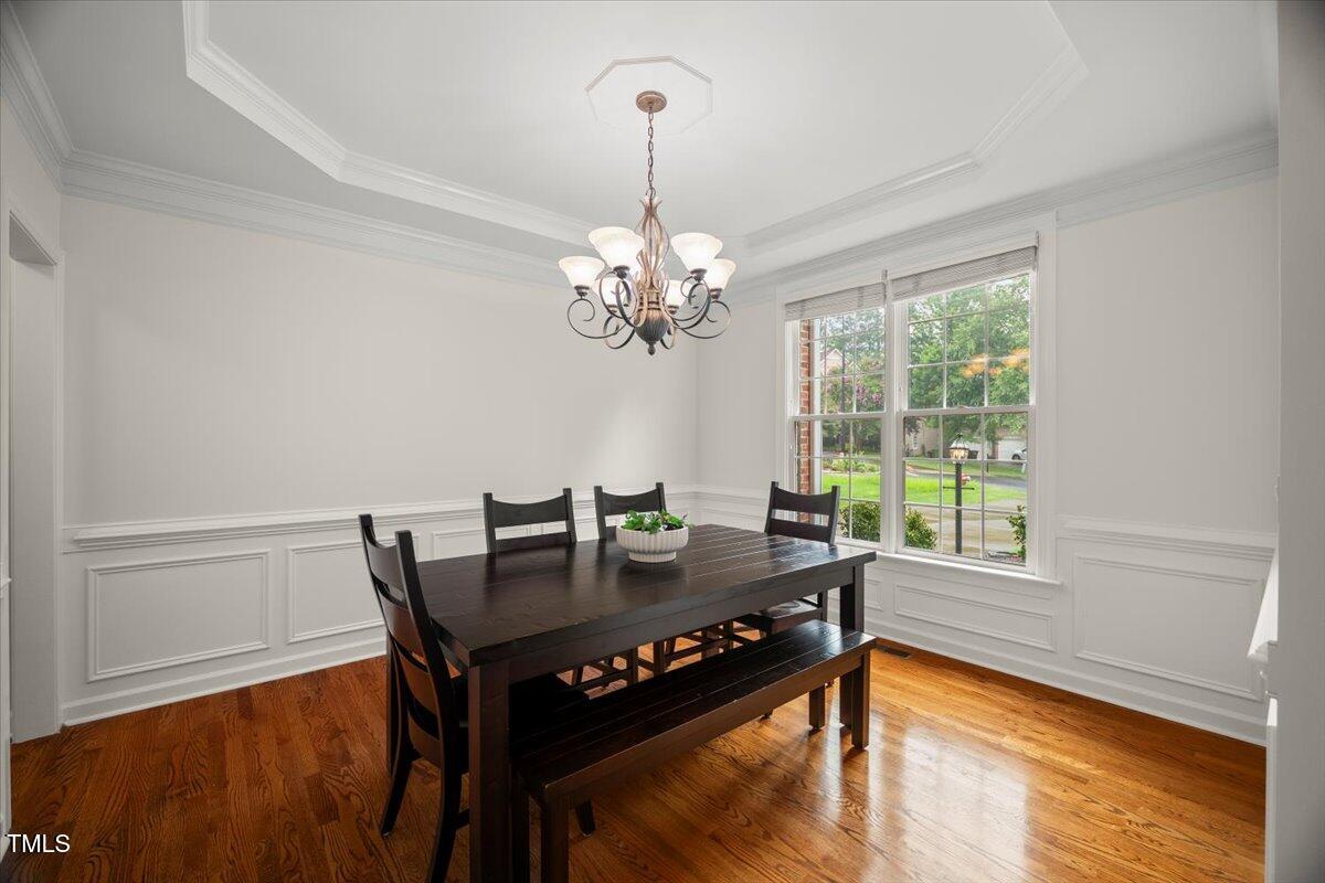 12204 Kaysmount Court Raleigh, NC 27614 - Photo 7 of 50 a view of a dining room with furniture and window