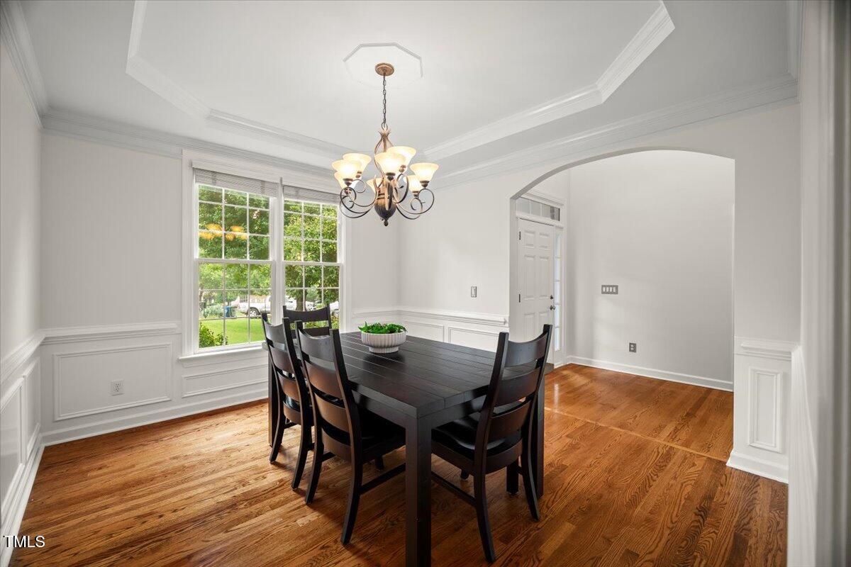 12204 Kaysmount Court Raleigh, NC 27614 - Photo 9 of 50 a view of a dining room with furniture window and wooden floor