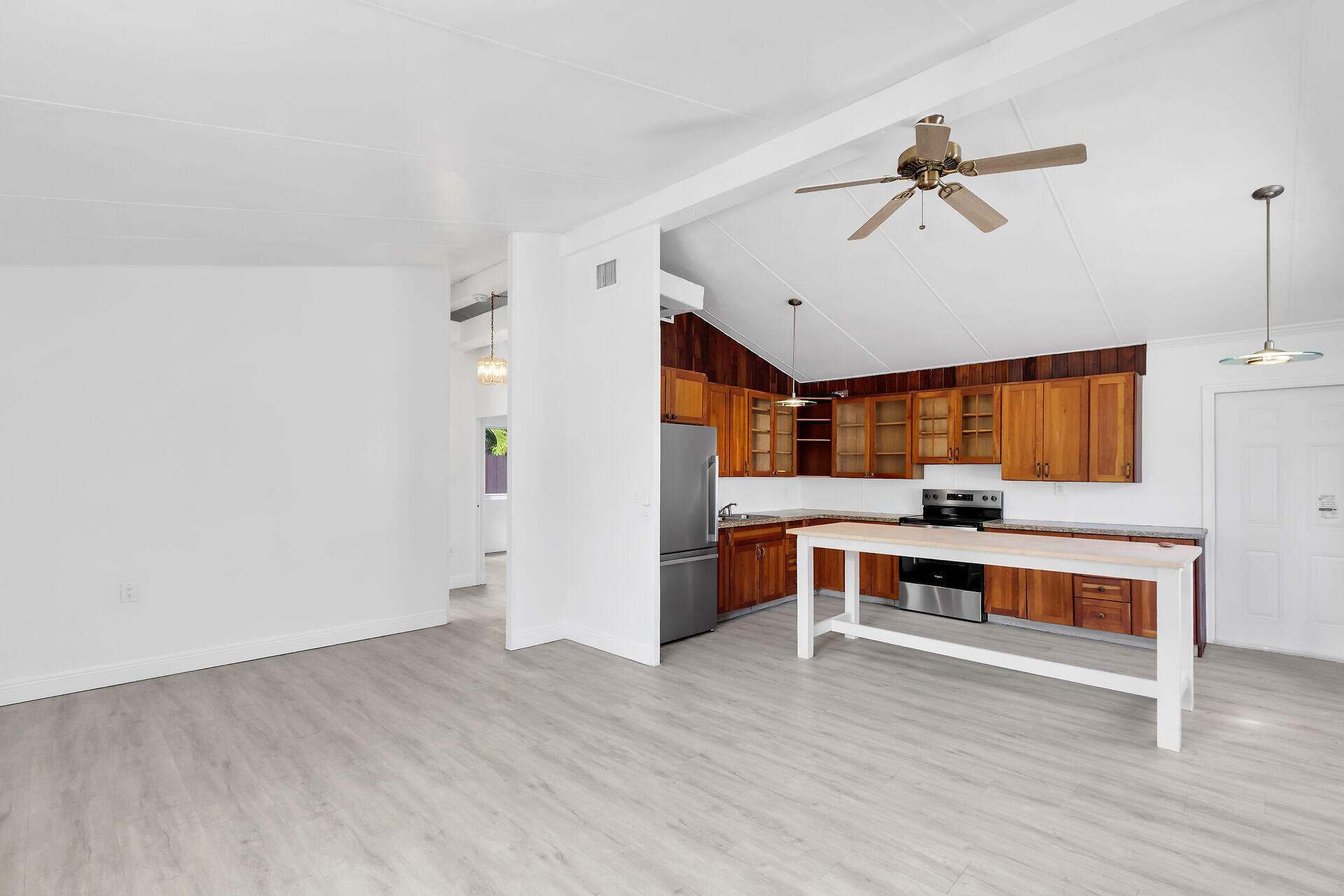 417 95th Street Marathon, FL 33050 - Photo 16 of 28 a view of a room with wooden floor and furniture