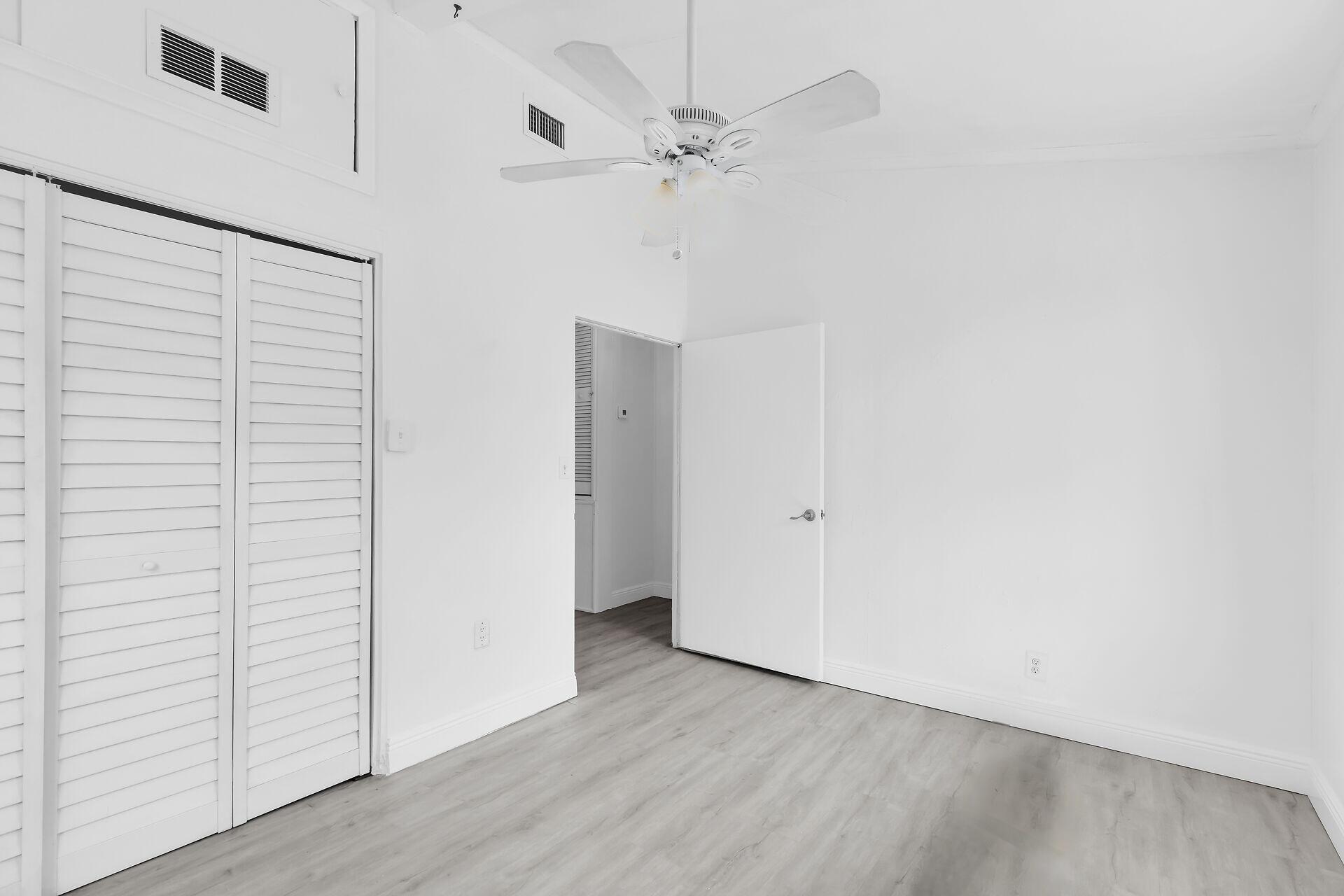 417 95th Street Marathon, FL 33050 - Photo 20 of 28 wooden floor in an empty room