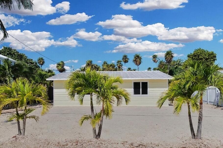 417 95th Street Marathon, FL 33050 - Photo 10 of 28 a view of a house with a yard
