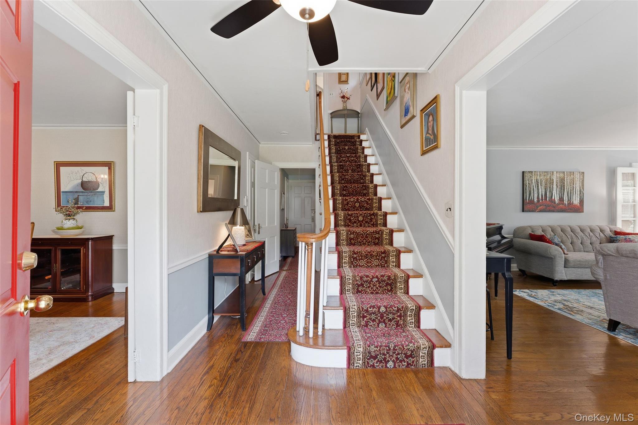 30 Birchbrook Road Bronxville, NY 10708 - Photo 2 of 34 Center Hall opening into the Living Room and Dining Room.
