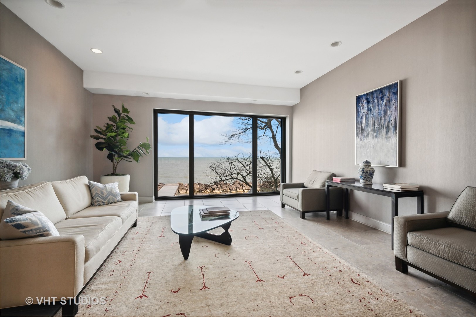 1616 Sheridan Road, Unit 10C Wilmette, IL 60091 - Photo 2 of 15 a living room with furniture and a large window
