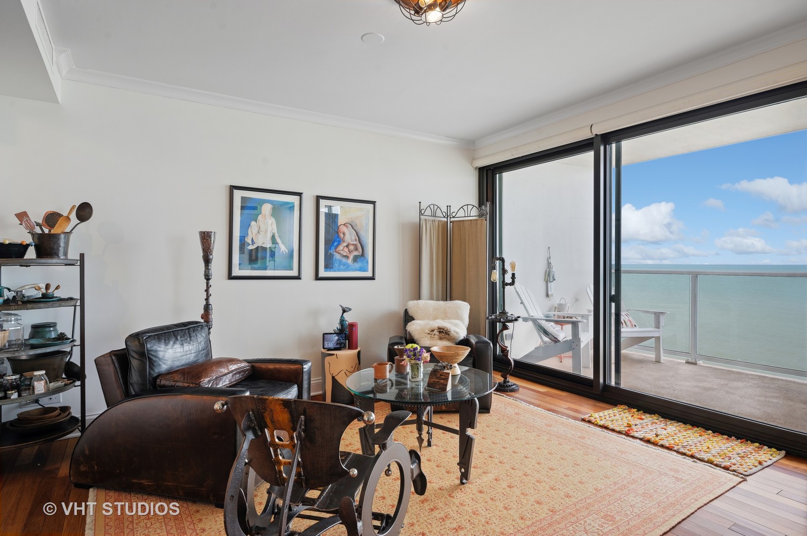 1616 Sheridan Road, Unit 10C Wilmette, IL 60091 - Photo 7 of 15 a living room with furniture a rug and a large window