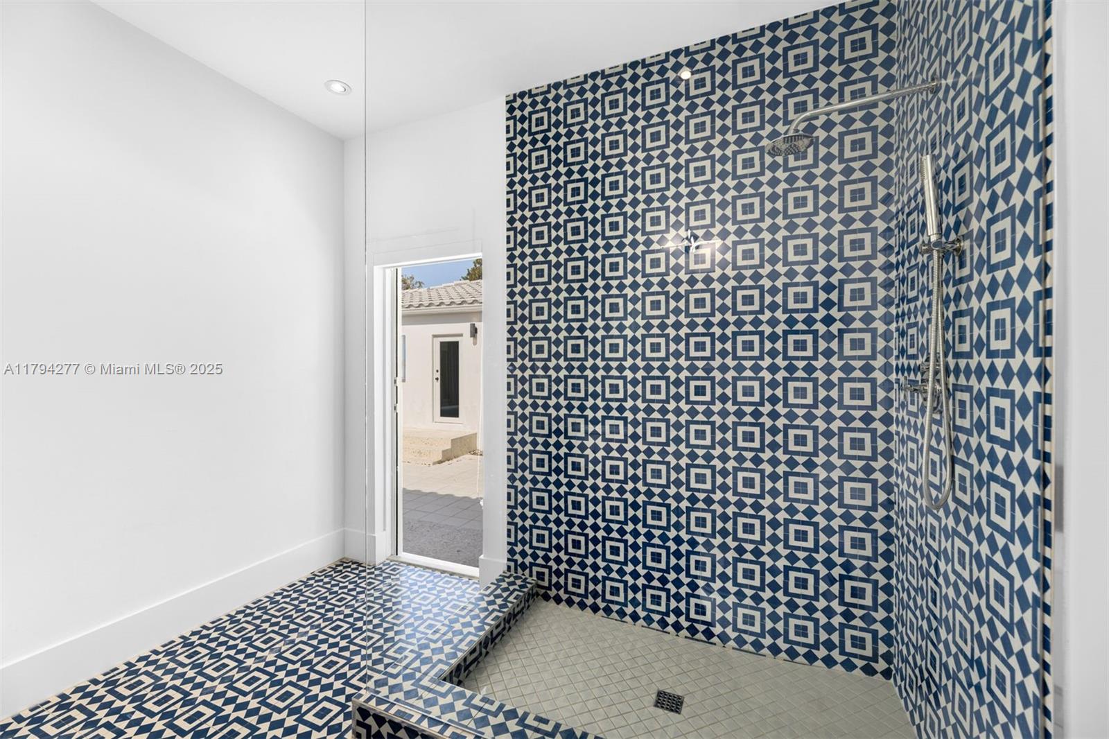 712 Northeast 72nd Street Miami, FL 33138 - Photo 16 of 35 a bathroom with a shower